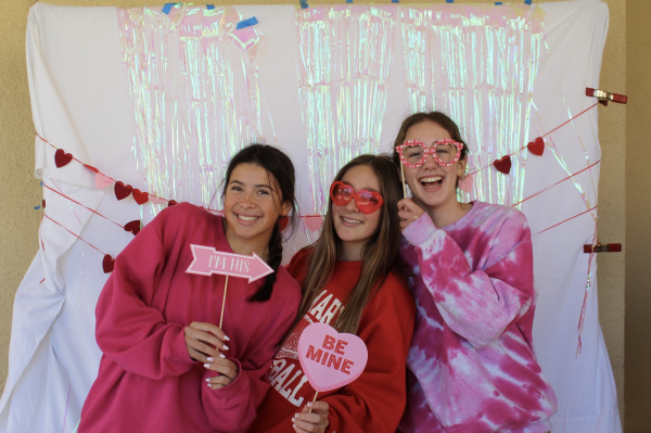 Juniors Nina Wall, Luci Caron and Paige Lambert pose in celebration of Valentine’s Day. 
